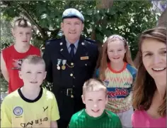  ??  ?? A family affair: Garda Mick Dee with his children Darragh, Rory, Rachael and Daniel alongside his wife Mairéad in Cyprus.