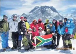  ??  ?? UNITED: South African climbers Saray Khumalo and Sibusiso Vilane from Buntu Everest at the peak of Lobuche East in 2014. This peak is on the standard south-east route up Everest and is one of the last stops on the way to the Everest Base Camp.