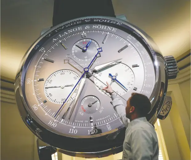  ?? FABRICE COFFRINI / AFP / GETTY IMAGES FILES ?? Richemont, which purchased online store Watchfinde­r, views the second-hand market as the best place to assess the value and demand of watches.