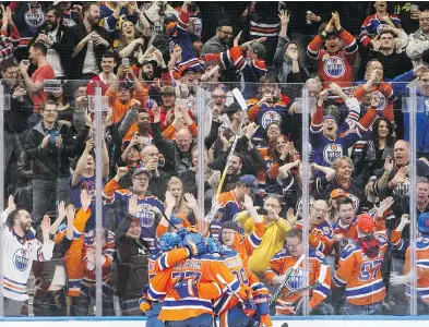  ?? JASON FRANSON / THE CANADIAN PRESS ?? Oilers fans have some postseason celebratin­g to look forward to — and they’re hoping for more scenes like this one from the Oilers-Ducks game April 1.