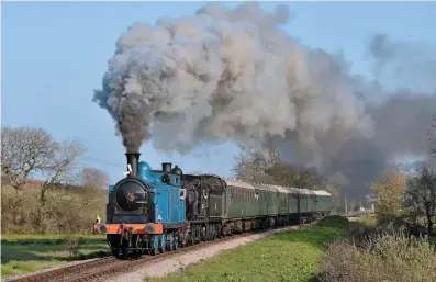  ?? StePhen ginn ?? ‘caley 419’ double-heads with resident Drummond ‘t9’ no. 30120 – another engine with Scottish links – climbing the grade towards Harmans cross during the ‘Scottish, Southern & Sulzer’ gala on march 30.