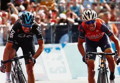  ??  ?? Fight to the finish: Italy’s Vincenzo Nibali (right) sprints to cross the finish line ahead of Spain’s Mikel Landa during the 16th stage of the Giro d’Italia on Tuesday. — AFP