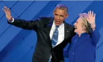  ?? PHOTO: REUTERS ?? Hillary Clinton joins Barack Obama on stage after his speech at the Democratic National Convention in Philadelph­ia.