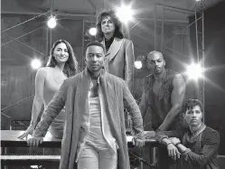  ?? James Dimmock/NBC via AP ?? ■ This image released by NBC shows, clockwise from foreground center, John Legend as Jesus Christ, Sara Bareilles as Mary Magdalene, Alice Cooper as King Herod, Brandon Victor Dixon as Judas Iscariot and Jason Tam as Peter from the NBC production “Jesus Christ Superstar Live In Concert,” which airs Sunday.