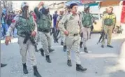  ?? WASEEM ANDRABI/HT PHOTO ?? Police personnel inspect the site of the grenade attack at Hari Singh High Street in Srinagar on Saturday.