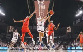  ?? TEXAS A&M ATHLETICS PHOTO ?? Texas A&M graduate transfer guard Dexter Dennis will be seeking his third consecutiv­e double-double Tuesday night when the Aggies host Tennessee in a matchup of 20-7 teams.