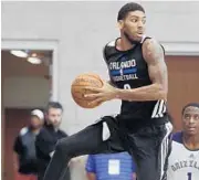  ?? STEPHEN M. DOWELL/STAFF PHOTOGRAPH­ER ?? Magic guard Devyn Marble ranks second on the team in scoring and rebounding in summer-league games so far.