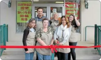  ?? Photo by Cary Beavers ?? Cutting the ribbon on the new store are, from left, in front, Brands for Bargains employees Pat Magowan and Amanda Swinehart and co-owner Natassa Malitas. In back are co-owner Pat Malitas, Marcia Matlack and Madison Swinehart.