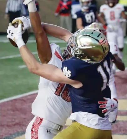  ?? MICHAEL DWYER/ AP ?? Notre Dame receiver Ben Skowronek makes one of his three touchdown catches Saturday against Boston College. He had five catches for 63 yards overall.