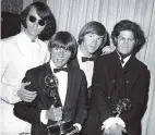  ?? AP file ?? The Monkees, from left, Mike Nesmith, Davy Jones, Peter Tork, and Micky Dolenz were awarded an Emmy for best comedy series on June 4, 1967.