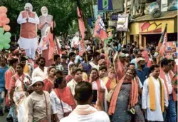  ??  ?? BJP SUPPORTERS AT AN ELECTION RALLY in Kolkata on April 5 ahead of the third phase of voting in West Bengal. The election rallies and the Kumbh Mela went ahead as if the country had truly beaten COVID-19, which was far from the truth.