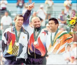  ?? GETTY ?? One of the last golden moments of Indian tennis in singles: (From right) Leander Paes (bronze), Andre Agassi (gold) and Sergi Bruguera (silver) on the 1996 Atlanta Olympics podium.