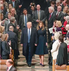  ?? — AP ?? President Donald Trump and First Lady Melania Trump arrive for a National Prayer Service at the National Cathedral, in Washington, on Saturday.