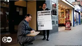  ??  ?? Esther Jardim from London looked for a job with a sandwich board tied to her chest