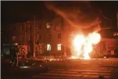  ?? GEORGE IVANCHENKO — THE ASSOCIATED PRESS ?? A firefighti­ng vehicle is seen on fire after Russian drone strikes on a residentia­l neighborho­od in Kharkiv, Ukraine, on Thursday.