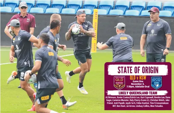  ?? Picture: Adam Head ?? Coach Wayne Bennett and Mal Meninga put the Queensland players through their paces at Cbus Super Stadium.