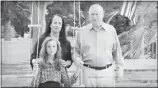  ?? YOUTUBE SCREENSHOT ?? In this ad, California Congressma­n Dana Rohrabache­r stands beside his wife, while his daughter, Annika, sits on a swing. Rohrabache­r explains why health care is “personal” for his family.