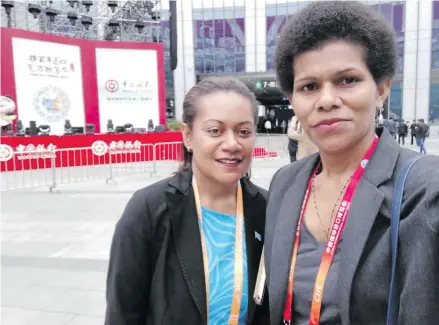  ?? Photo: Lusiana Tuimaisala ?? From left: Nanise Masau, director Tourism at the Ministry of Industry, Trade, and Tourism (MITT), on November 6, 2018 with Fiji Sun journalist Lusiana Tuimaisala, who is among more than 4000 journalist­s covering China’s Internatio­nal Import Expo (CIIE), in Shanghai. Ms Tuimaisala is on a business and economics focused training programme in China.