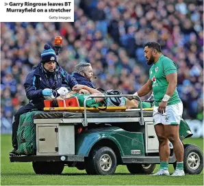  ?? Getty Images ?? > Garry Ringrose leaves BT Murrayfiel­d on a stretcher
