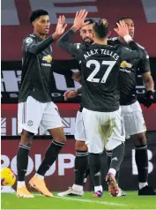  ??  ?? Marcus Rashford is hailed after scoring against the Blades