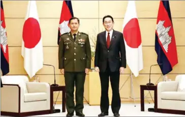  ?? HUN MANET VIA FACEBOOK ?? Japanese Prime Minister Fumio Kishida (right) and Lieutenant General Hun Manet, Deputy Commander-in-Chief of the Royal Cambodian Armed Forces during the latter’s visit to Japan in February.