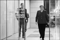  ?? PAUL ZINKEN / DPA VIA ASSOCIATED PRESS ?? German Chancellor Angela Merkel arrives for the recording of an interview at the public-service broadcaste­r ZDF in Berlin, on Sunday.