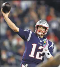  ?? Michael Dwyer / Associated Press ?? Patriots quarterbac­k Tom Brady passes under pressure from the Chiefs in an Oct. 14 game.