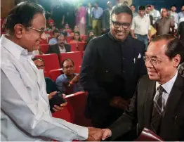  ?? — PTI ?? Supreme Court judge Justice Ranjan Gogoi with Congress leader and senior advocate P. Chidambara­m during an event in New Delhi on Thursday.