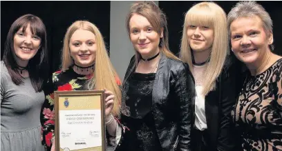  ??  ?? From left: Learning and developmen­t co-ordinator Alicia Whittaker, apprentice­s Jodie Challinor, Kelly Wood and Katy Dewar, and clinical operations director Helen Knight with the award