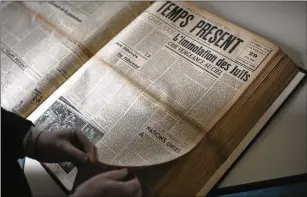  ?? ?? The Temps Present newspaper with two letters signed by Joseph Borne, Prime Minister Élisabeth Borne’s father, is shown Jan. 24. Joseph Borne survived Auschwitz-birkenau, the notorious Nazi camp where 1 million Jews were killed, and died by suicide when Élisabeth Borne was 11.