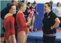  ?? CLIFFORD SKARSTEDT EXAMINER FILE PHOTO ?? Kawartha Gymnastics’ Becky Ansell, right, retired as head coach after 20 years to focus on her new job teaching Grade 2.
