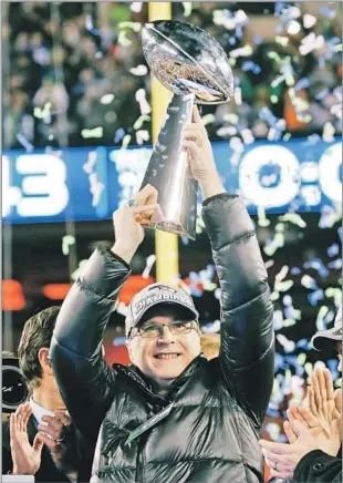  ?? Paul Sancya Associated Press ?? RICH MAN, SPORTS FAN Paul Allen used his Microsoft fortune to buy the Seattle Seahawks and Portland Trail Blazers. Above, he holds the Vince Lombardi Trophy after the Seahawks won the Super Bowl in 2014.