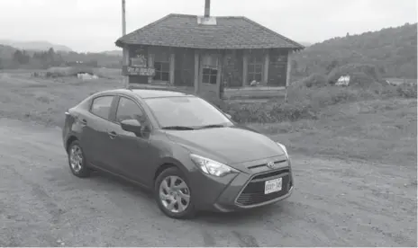  ?? GARY GRANT PHOTOS FOR THE TORONTO STAR ?? All Yaris sedan models come standard with jewel-like halogen headlights. Premium models receive integrated fog lights.