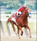  ??  ?? Justify with jockey Mike Smith up, leads down the stretch before winning the 150th running of the Belmont Stakes horse race, on June 9,
in Elmont, NY. (AP)