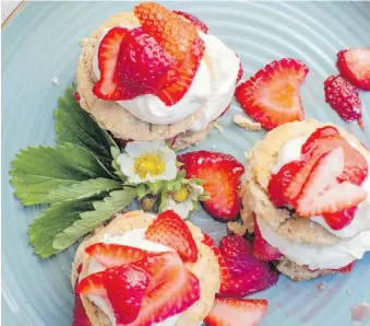  ??  ?? One of the 50 enticing recipes in Awesome Ancient Grains and Seeds is strawberry shortcake made with whole wheat flour, flaked quinoa and yogurt.