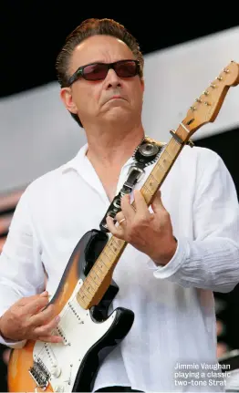  ??  ?? Jimmie Vaughan playing a classic two-tone Strat