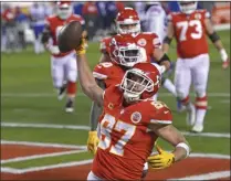  ?? REED HOFFMANN - THE ASSOCIATED PRESS ?? Kansas City Chiefs tight end Travis Kelce celebrates after catching a 5-yard touchdown pass during the second half of the AFC championsh­ip NFL football game against the Buffalo Bills, Sunday, Jan. 24, 2021, in Kansas City, Mo.