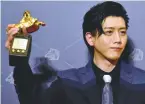  ?? AFP ?? Mo Tzu-yi wins Best Leading Actor. –
