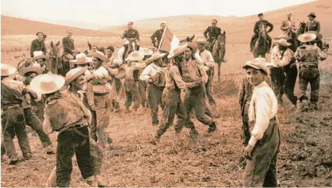  ?? Foto: imago ?? Sizilianis­che Bauern beim Musizieren und Tanzen auf dem Feld. Musik solcher Herkunft hat der Komponist Luciano Berio verarbeite­t.