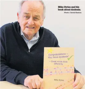  ?? Photo / David Haxton ?? Mike Styles and his book about dyslexia.