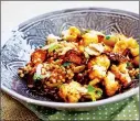  ??  ?? Above and below, roasted cauliflowe­r and couscous salad with olives and dates