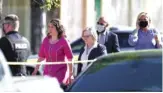  ?? AP PHOTO BY CALVIN MATTHEIS ?? Knoxville Mayor Indya Kincannon, left, arrives at the scene of a police shooting at Austin-East High School on Monday, April 12, 2021.