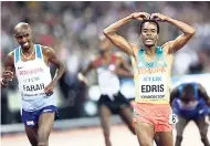  ?? AP ?? Ethiopia’s Muktar Edris (right) reacts after winning the 5000m final ahead of Britain’s Mo Farah during the World Athletics Championsh­ips in London yesterday.
