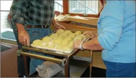  ?? SUBMITTED PHOTO - BARBARA COVEY ?? Friedens UCC, Oley, hosted its first Faschnacht sale this year, using one of the recipes passed down through generation­s of one of their church families. Friedens made and sold almost 300 bags of the pastries.