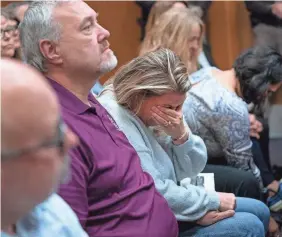  ?? PHOTOS BY MANDI WRIGHT/USA TODAY NETWORK ?? Craig Shilling, father of Justin Shilling, left, sits with Steve St. Juliana, father of Hana St. Juliana, and Nicole Beausoleil, mother of Madisyn Baldwin who is overcome by emotion, as James Crumbley is found guilty on four counts of involuntar­y manslaught­er Thursday.