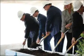  ?? ERIC BONZAR — THE MORNING JOURNAL ?? Public officials, board members and Mercy Health Senior Vice President and CEO Ed Oley, third from left, break ground on Mercy Health’s new Oak Point Medical Center, April 12.