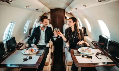  ?? EXTREME-PHOTOGRAPH­ER/Getty Images ?? Private jets emit about 20 times more carbon dioxide per passenger mile than commercial flights, according to industry data Photograph: