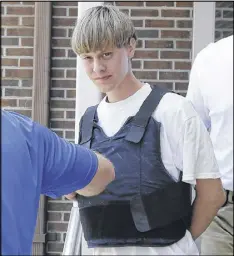  ?? CHUCK BURTON / ASSOCIATED PRESS ?? The federal trial of Dylann Roof, accused of killing nine people at the fellowship hall at Emanuel AME Church in Charleston, S.C., started Wednesday at the federal courthouse in Charleston.