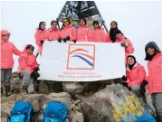  ?? Supplied photos ?? Asma Al Qayedi receives honour from Sheikh Saqr bin Mohammed Al Qasimi and, right, the members of the girls team on top of the highest peak in the Atlas range, Tokubal. —