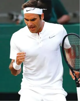  ??  ?? Roger Federer clebrates winning a point against Grigor Dimitrov Photo: AP
